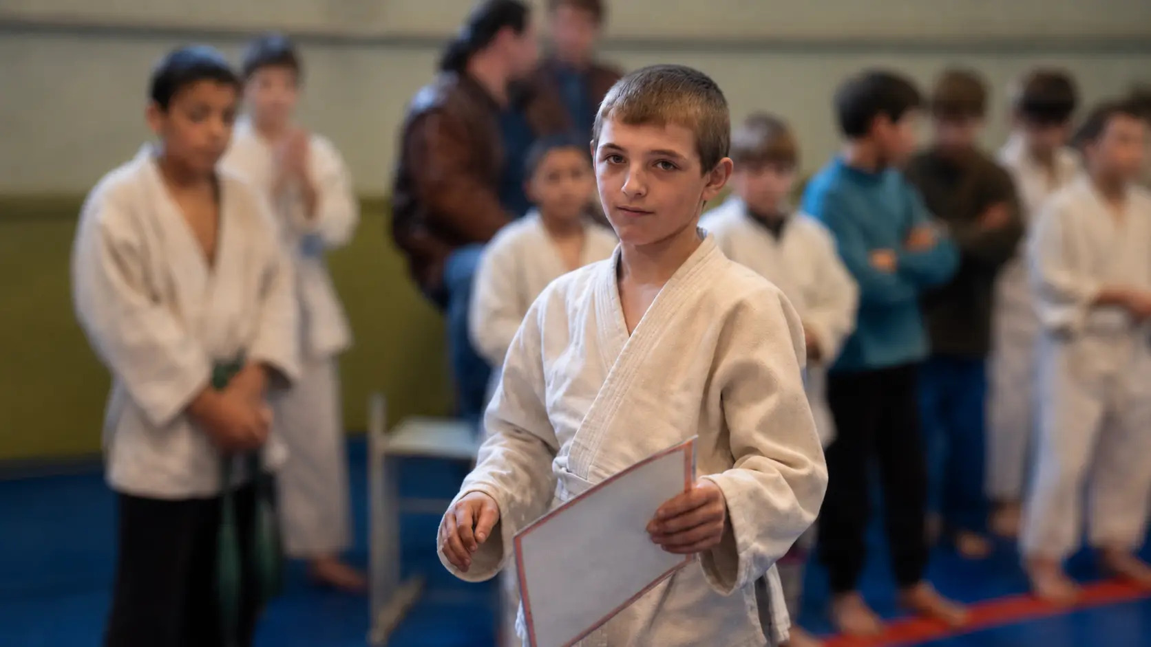 Vitalii Kasap in judo gi, on the mat.